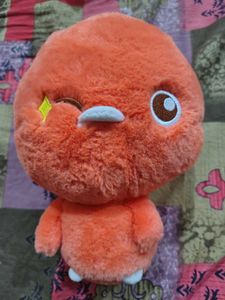 Adorable Orange Plush Toy - Winking Star!