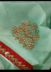 Elegant Red saree with Embellishments