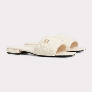 Gucci Embossed Slides - Cream