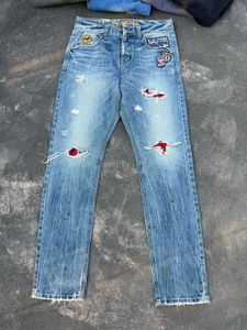 Distressed Patch Jeans