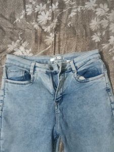 Light wash Boot cut low rise jeans for Women.