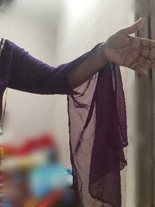 Elegant Purple Gown with Gold Embellishments