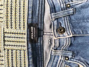 Light Blue Distressed Denim Jeans