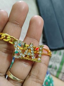 Gold Plated chain with locketof  Name  "SAI"