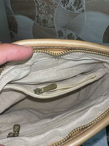 Stylish Gold Crossbody Bag Thoda damage hai photos