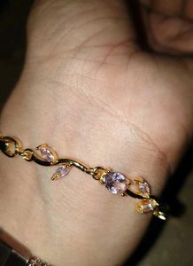 Elegant Rose Gold Bracelet with Pink Stones