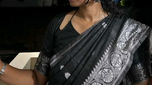 Elegant Black Saree with Silver Border