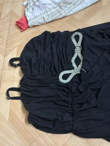 Elegant Black Ruched Dress with Embellished Waist