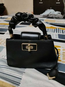 Chic Black Handbag with Scrunchie Handle