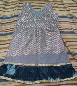Sparkling frock with comfortable trouser .