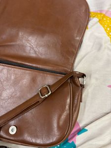 Brown sling bag