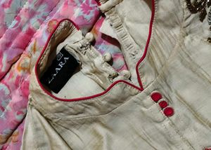 Elegant Beige Kurta with Red Accents