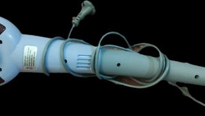 Evexia Handheld Massager with 7 attachments