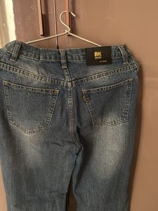 Distressed Blue Denim Jeans