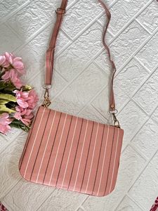 Peach stripped box sling bag