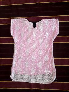 Pink Lace Topwith Magenta bottom wear.