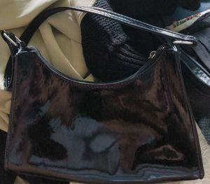 Chic Black Shoulder Bag with Fun Charm