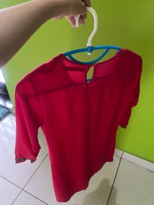 Elegant Ruby Red Kurti with embellished Sleeves
