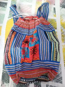 Embroidered bag pack lovely for travel and trendy. Totally unused.