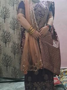 Elegant Purple Saree with Intricate Gold Weave