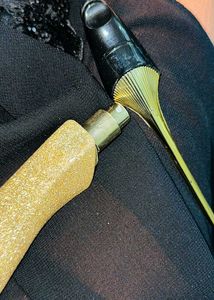 Sparkling golden Perfume Bottle