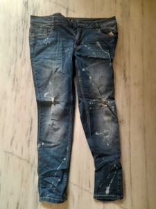Distressed Blue Jeans with Paint Splatter