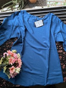 Blue top with cut work sleeves