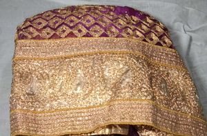 Elegant Purple Saree with Gold Embroidery