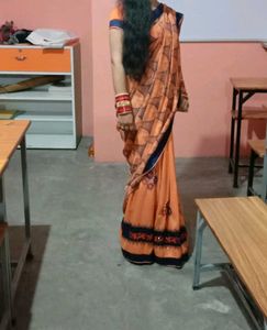 Elegant Orange Embroidered Saree