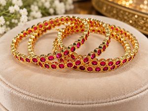 Elegant Gold Bangles with Red Stones