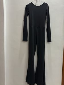 Newme Black Open Back Flare Jumpsuit