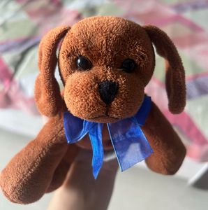 Cute Brown Plush Dog Toy with Blue Bow