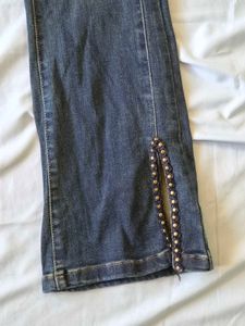 Flared Jeans with Studded Slits