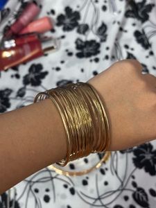 Set of Gold Tone Bracelets and Neck pieces