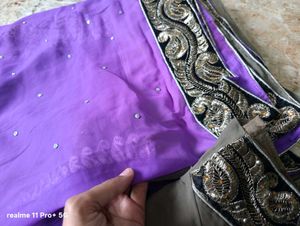 Elegant Purple Saree with Intricate Border