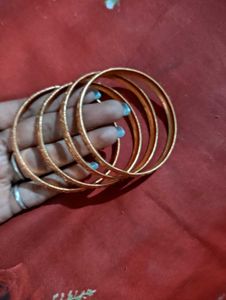 Set of 4 Intricately Carved Gold Bangles