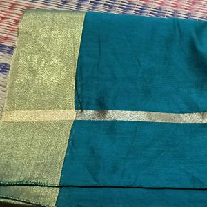 Elegant Teal Saree with Gold Border