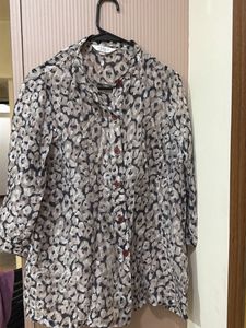 Stylish Button-Up Blouse with Animal Print