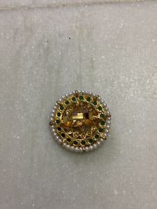 GREEN STONE STATMENT ROUND RING.