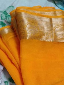 Vibrant Yellow Saree with Gold Border