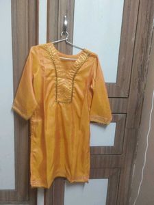 Vibrant Orange Kurta with Embellished Sleeves