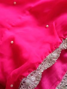 Vibrant Pink Saree with Pearl Embellishments