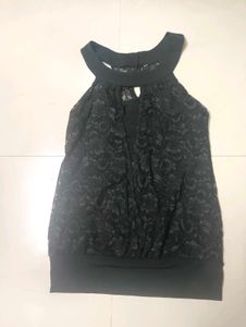 Black halter neck top.