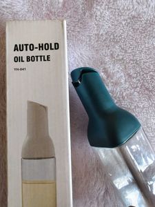 Auto-Hold Glass Oil Bottle