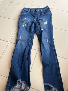 Distressed Blue Denim Jeans