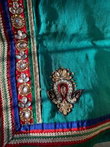 Embellished Teal Super net Saree