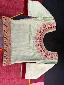 Stunning Mint Green Embroidered Lehenga Choli