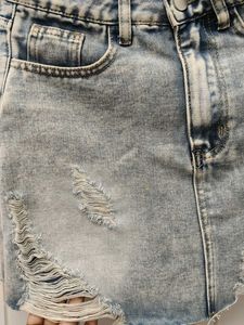 Distressed Denim Mini Skirt