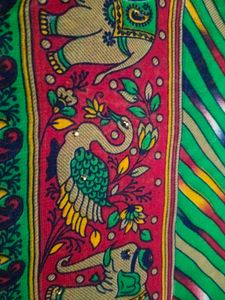 Vibrant Striped Saree with Elephant Border