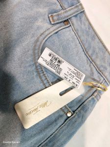 Light Wash Denim Fringed Mini Skirt